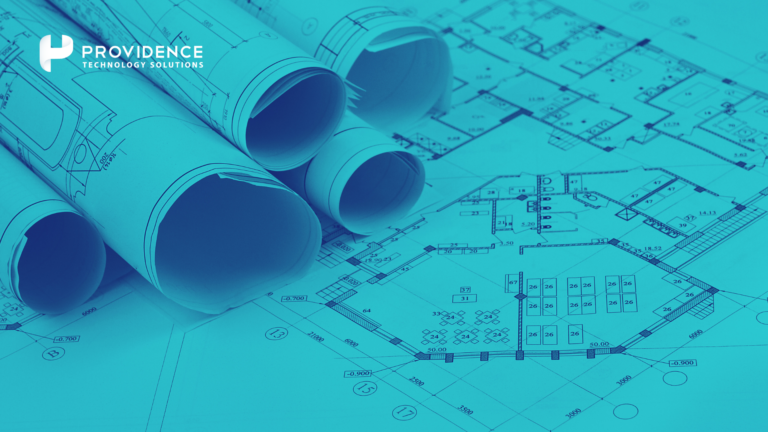 Blueprints rolled out on a table with the Providence Technology Solutions logo in the corner, representing a structured approach to HCM implementation as discussed in the blog.