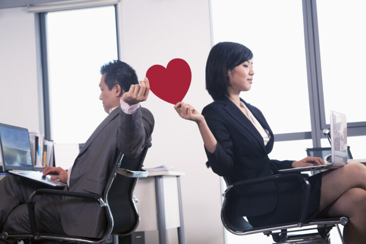 Your Boss Doesn’t Hate That You’re Dating a Co-Worker—Survey Says So!