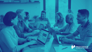 A diverse team of full-time and freelance professionals collaborating on a project in a modern office setting.